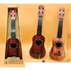 Гітара 8808D 4 струни, медіатор, 2 кольри, кор., 47,5-15,5-5 см.